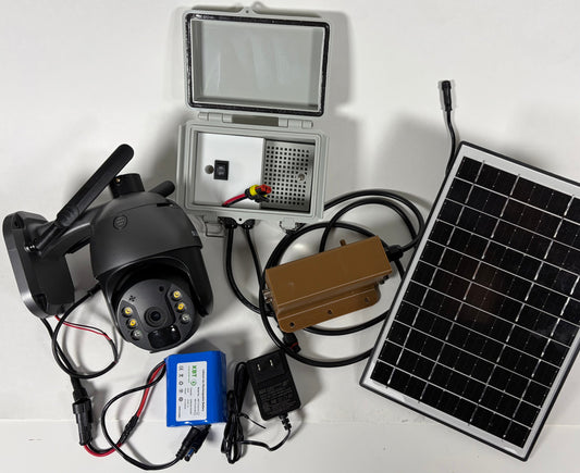 Collection of electronic components including a solar panel, battery, and wiring on a white background